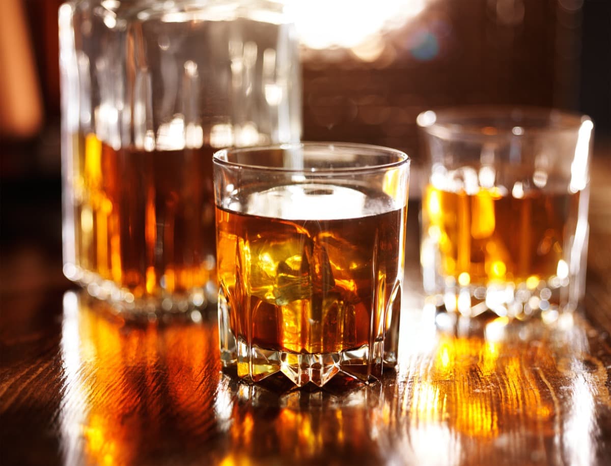 Whisky glasses on elegant home bar setup
