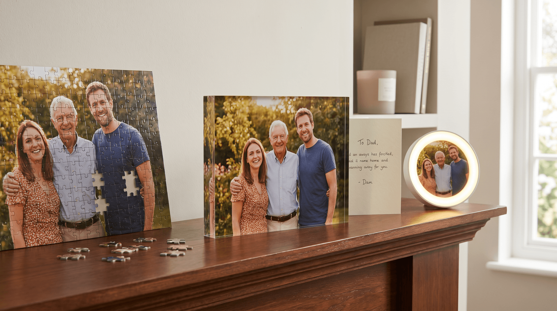 Personalised acrylic photo block, photo jigsaw and warm LED light featuring a family photo on a wooden mantelpiece